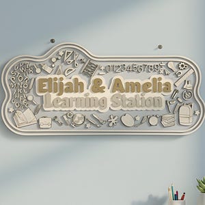 May include: A rectangular wall sign with rounded edges featuring the text Elijah & Amelia Learning Station in raised beige lettering. The sign is decorated with various school-themed icons including numbers, letters, a backpack, and books.