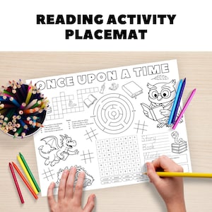 May include: A white reading activity placemat with the text "ONCE UPON A TIME" and "READING ACTIVITY PLACEMAT". The placemat features a maze, crossword, and illustrations of a dragon, owl, and books. Colored pencils and crayons are also visible.