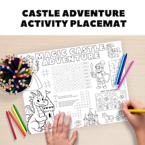 May include: A white activity placemat with the text "CASTLE ADVENTURE ACTIVITY PLACEMAT" and "MAGIC CASTLE ADVENTURE". The placemat features a princess, dragon, knight, and other castle-themed illustrations, with a maze, crossword, and "Spot the Difference" game.