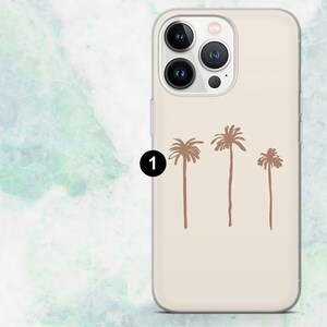 K&ouml;nnte beinhalten: Beigefarbene Handyh&uuml;lle mit minimalistischem Design von drei braunen Palmen. Die H&uuml;lle hat einen transparenten Rand und einen Kameraausschnitt. Die Palmen sind unterschiedlich hoch und schaffen eine einfache, aber stilvolle &Auml;sthetik.