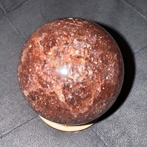 Glittery Strawberry Quartz Crystal Sphere With Stand