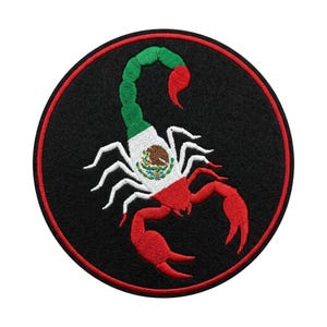 May include: Embroidered patch featuring a scorpion design. The scorpion's body is colored with the Mexican flag's green, white, and red. The patch is round, with a black background and a red border. The scorpion's claws and tail are red.