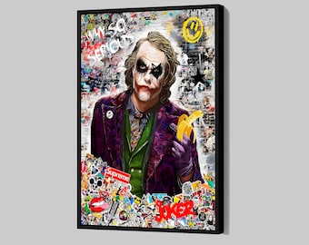 May include: Framed artwork featuring a portrait of the Joker with makeup and a purple suit, holding a banana. The background is a collage of graffiti and stickers, including the word "Supreme". The text "Why So Serious" is visible.