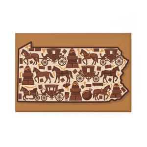 May include: A rectangular magnet featuring a brown outline of the state of Pennsylvania. The interior is filled with repeating illustrations of brown horses, carriages, and chocolate-themed designs on a cream background.