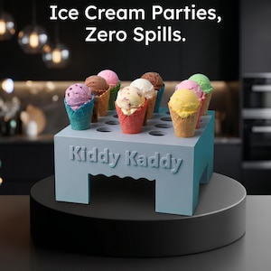 May include: A light blue Kiddy Kaddy ice cream cone holder with multiple circular cutouts, holding several colourful ice cream cones. The text Thiele Innovations, Ice Cream Parties, Zero Spills, and Holds 20 Cones is visible on the display.
