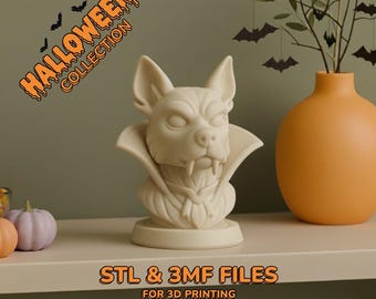 May include: A cream-colored bust of a dog-like creature with fangs and a cape, part of the Halloween Collection. The text "STL & 3MF FILES FOR 3D PRINTING" is displayed below. Decorative bats and a vase are in the background.