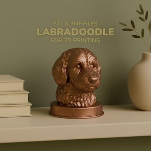 May include: A bronze-coloured Labradoodle bust for 3D printing. The sculpture has detailed fur texture and sits on a round base. Text on the image reads: STL & 3MF FILES, LABRADOODLE, FOR 3D PRINTING.