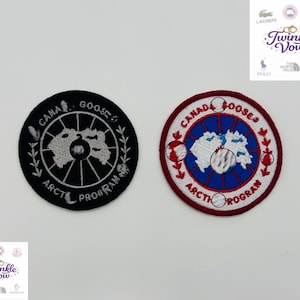 May include: A set of three ceramic mugs with a speckled, matte finish in cream, light grey, and dark grey. Each mug has a simple, minimalist design and a rounded handle.