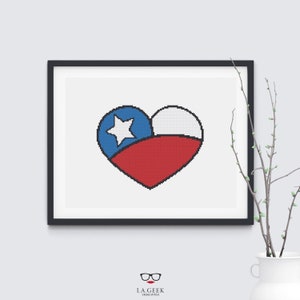 May include: A cross-stitch pattern of a heart shaped Chilean flag. The heart is red, white, and blue with a white star in the blue section.