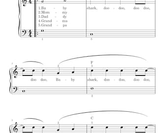 Pode incluir: Partitura da canção infantil "Baby Shark Song". A partitura é apresentada em um fundo branco com notas e texto pretos. O título está no topo e as letras estão incluídas.