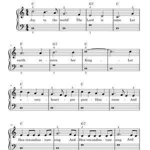 Op de afbeelding: Muziekblad voor "Joy to the World" met muzieknoten en tekst. De titel staat bovenaan, de muziek is in zwart op een witte achtergrond geschreven. De songteksten worden onder de noten weergegeven.