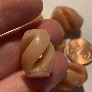 One Chinese Carved Bead Peach Aventurine Gemstone Open Carved Spiral 25mm x 17mm