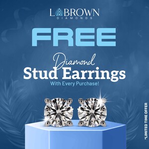 May include: A promotional image for L. Brown Diamonds features a pair of diamond stud earrings on a blue pedestal. The text "FREE Diamond Stud Earrings With Every Purchase!" is displayed in white and blue.