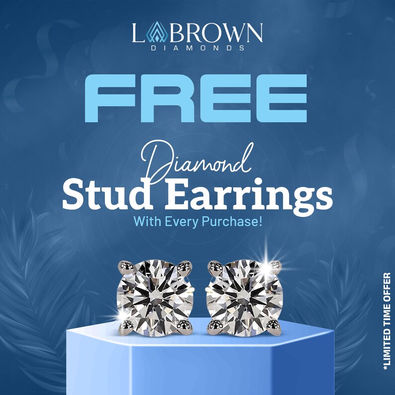 May include: A promotional image for L. Brown Diamonds features a pair of diamond stud earrings on a blue pedestal. The text "FREE Diamond Stud Earrings With Every Purchase!" is displayed in white and blue.