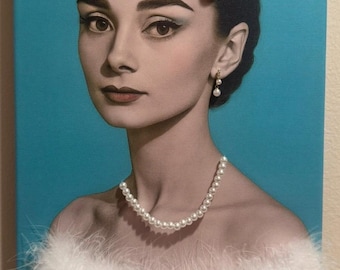 Audrey Hepburn with 3-D jewelry and faux fur