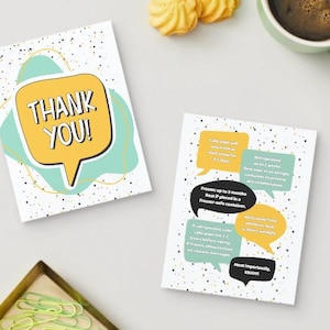 May include: Two white cards with speech bubble designs. One card says "THANK YOU!" in a yellow bubble. The other card has instructions in yellow, teal, and black bubbles. A green mug of coffee and cookies are in the background.