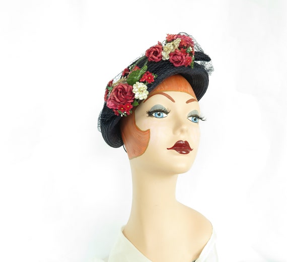 Blue vintage hat, pink flowers, French tilt, woman