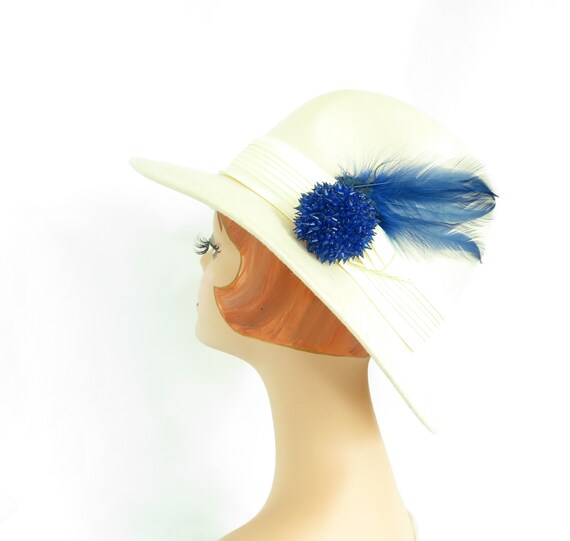 White fedora hat, vintage 1970s, blue feather and