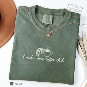 Coffee lover mom shirt with minimal line art design showing cup and pastry on comfort colors tee