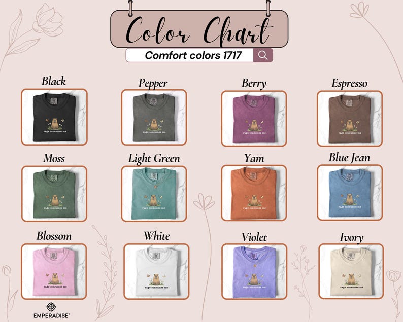 May include: A color chart displaying various Comfort Colors 1717 t-shirts in shades like black, moss, and violet. Each shirt features a graphic and is labeled with its color name. The chart includes the text "Color Chart" and "EMPERADISE".