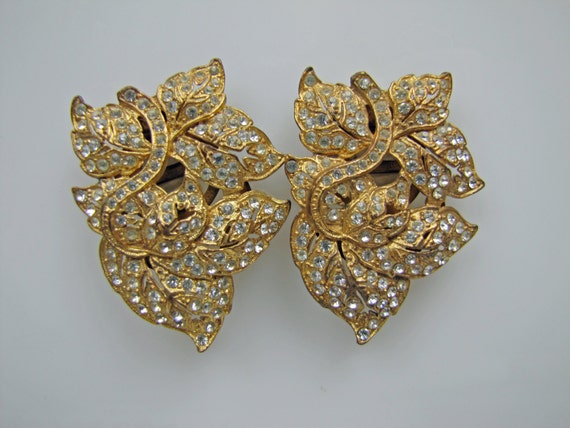 Paire des années 1930 Art déco jaune or Diamante pose Clips robe écharpe. Strass en cristal double broches. Antique Art Deco mariage bijoux de mariée | Qualité Fine
Paire des années années années 1930 Art déco jaune or Diamante pose Clips robe écharpe. Strass en cristal double broches. Antique Art Deco mariage bijoux de mariée | Qualité Fine
b2c9a9