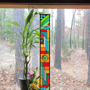 Stained Glass Panel - handcrafted abstract art glass - suncatcher - blown glass center disk - green nuggets - hanging stained glass panel