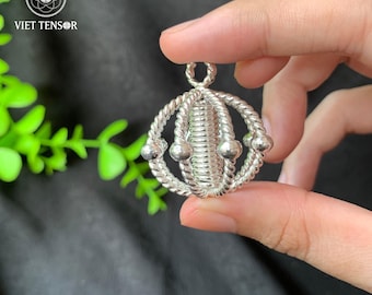 Personalized Tensor Pendant – Lost Cubit 177MHz Energy Generator, made of pure silver.
