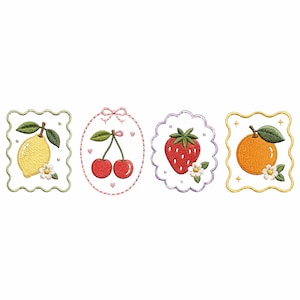 May include: Four embroidered patches featuring fruit designs: a yellow lemon in a scalloped square, two red cherries in an oval with a bow, a red strawberry in a scalloped circle, and an orange in a scalloped square, all with green leaves and white flowers.