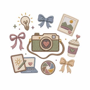May include: An embroidery design featuring a central green camera with a heart lens, surrounded by a lightbulb, three bows in blue, pink, and beige, a framed landscape photo, a coffee cup with a heart stirrer, a tablet with a stylus, and a lens.