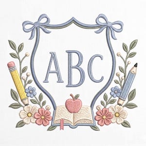 May include: Embroidered design featuring a blue shield with the letters "ABC" in the center. The shield is adorned with bows, pencils, flowers, an open book, and an apple. The design is in shades of blue, yellow, pink, and green.