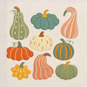 May include: An embroidery design featuring nine distinct pumpkins in various shapes and sizes. The collection includes gourds in shades of sage green, muted orange, cream, teal, and soft peach, each detailed with textured stitching and stems.