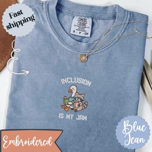 Camisa bordada com cores confortáveis de ganso e guaxinim: presente de volta às aulas para professores