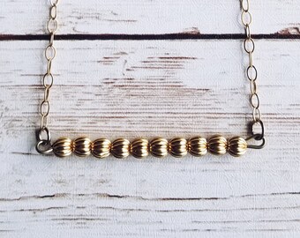 Gold Bead Bar Necklace