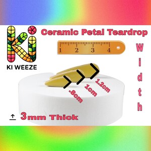 May include: A yellow ceramic petal teardrop, .8cm wide, 1cm long, and 1.2cm at its widest point, with a thickness of 3mm. The product is displayed on a white surface. The text "Ceramic Petal Teardrop" and "KI WEEZE" are visible.