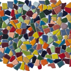 May include: An oval mosaic composed of irregularly shaped ceramic tiles in a variety of colors, including blue, green, yellow, orange, red, and black. The tiles are arranged closely together, creating a vibrant and textured surface.
