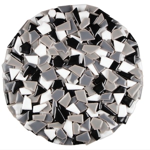 May include: Circular mosaic art piece composed of irregularly shaped tiles in shades of black, white, and gray. The tiles are arranged to create a textured surface, with a glossy finish. The mosaic is set against a plain white background.