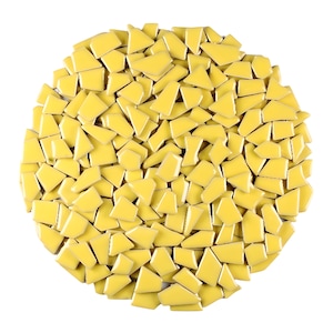 May include: A white ceramic mug with a black handle and the text "But First, Coffee" in a bold, black font. The mug is sitting on a wooden surface. The mug is approximately 4 inches tall.