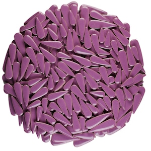 May include: A circular arrangement of numerous, glossy, teardrop-shaped objects in a muted purple hue. The objects are densely packed, creating a textured surface with highlights and shadows. The overall effect is a decorative, abstract design.