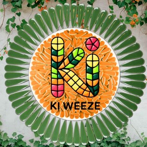 May include: A colorful logo design featuring the text "KI WEEZE" in a vibrant, multi-colored font. The logo is set against a background of orange slices and surrounded by green, leaf-shaped elements. The image is framed by a wall with greenery.
