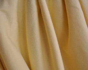 Interlock de algodón orgánico, 60" de ancho, color plátano