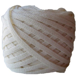 May include: A ball of off-white cotton rope with a woven pattern.