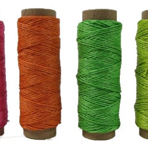 May include: Six spools of waxed cotton thread in various colours, including blue, pink, orange, green, lime green, and white.