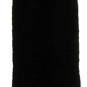 May include: A spool of black thread made from 100% organic cotton. The spool is labeled "100% Organic Cotton" and "Made in The Netherlands".