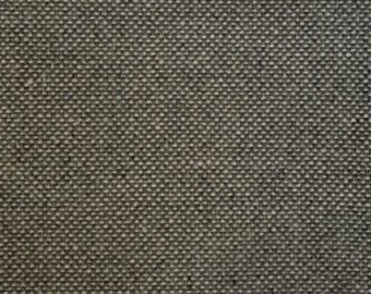 Könnte beinhalten: Nahaufnahme eines dunkelgrauen Gewebes mit einer dezenten Textur.