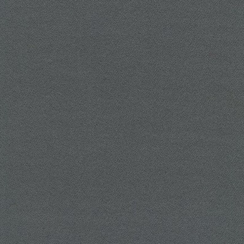 May include: A solid, dark gray textured surface.