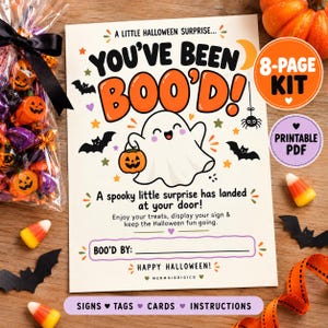 May include: A printable Halloween kit featuring a sign with the text A LITTLE HALLOWEEN SURPRISE... YOU'VE BEEN BOO'D! A spooky little surprise has landed at your door! Enjoy your treats, display your sign & keep the Halloween fun going. BOO'D BY: HAPPY HALLOWEEN! MERMAIDDIGICO.