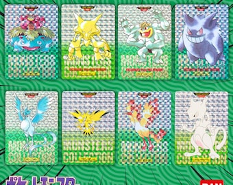 May include: A collection of eight holographic Pokémon trading cards from the Bandai Carddass 1996 series. The cards feature various Pokémon characters with the text "MONSTERS COLLECTION" and Japanese text. The background is a green, patterned design.