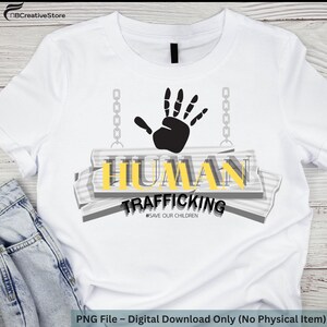May include: White t-shirt with a graphic design. The design includes a black handprint, the words "HUMAN TRAFFICKING" in yellow and gray, and the hashtag "#SAVE OUR CHILDREN".