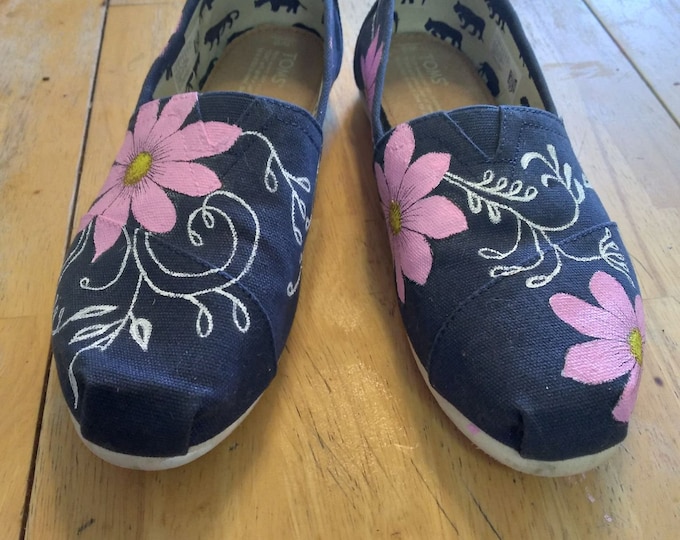 Custom toms are waiting for you, these pink flower with swirls are a pair of hand painted pieces sorry sold