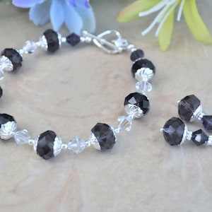 Lila Kristall und Silber Armband und Ohrringe